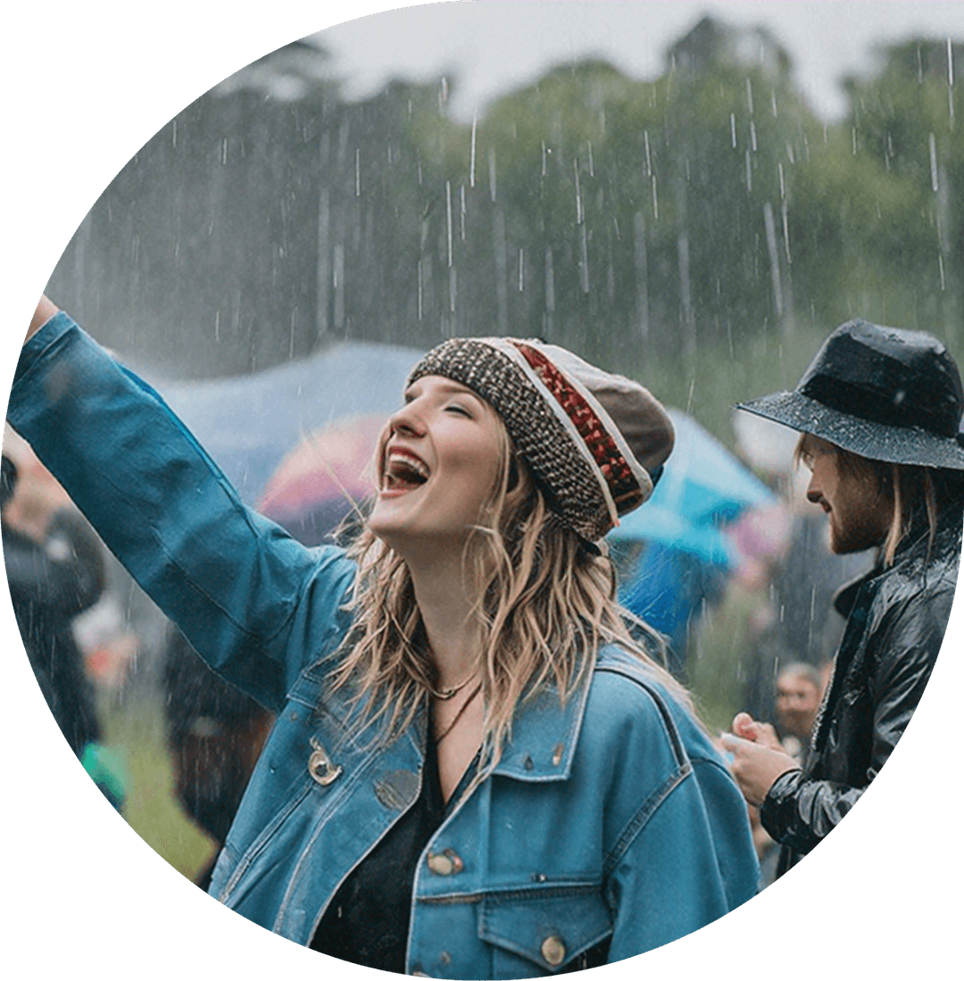 Woman enjoying festival in the rain